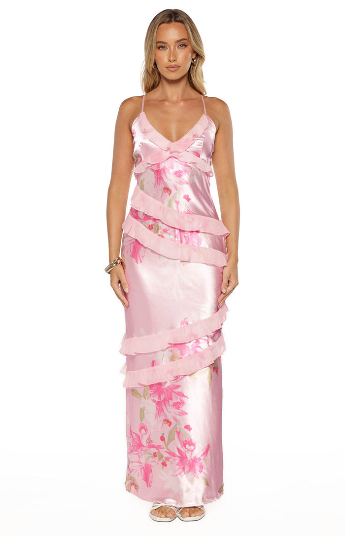 Front view of a pink floral print satin maxi dress with tiered sheer ruffles and V-neckline