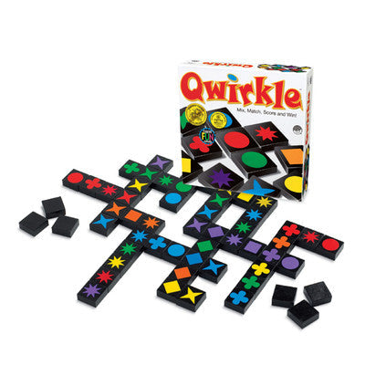 Colorful Qwirkle game pieces with box on a white background