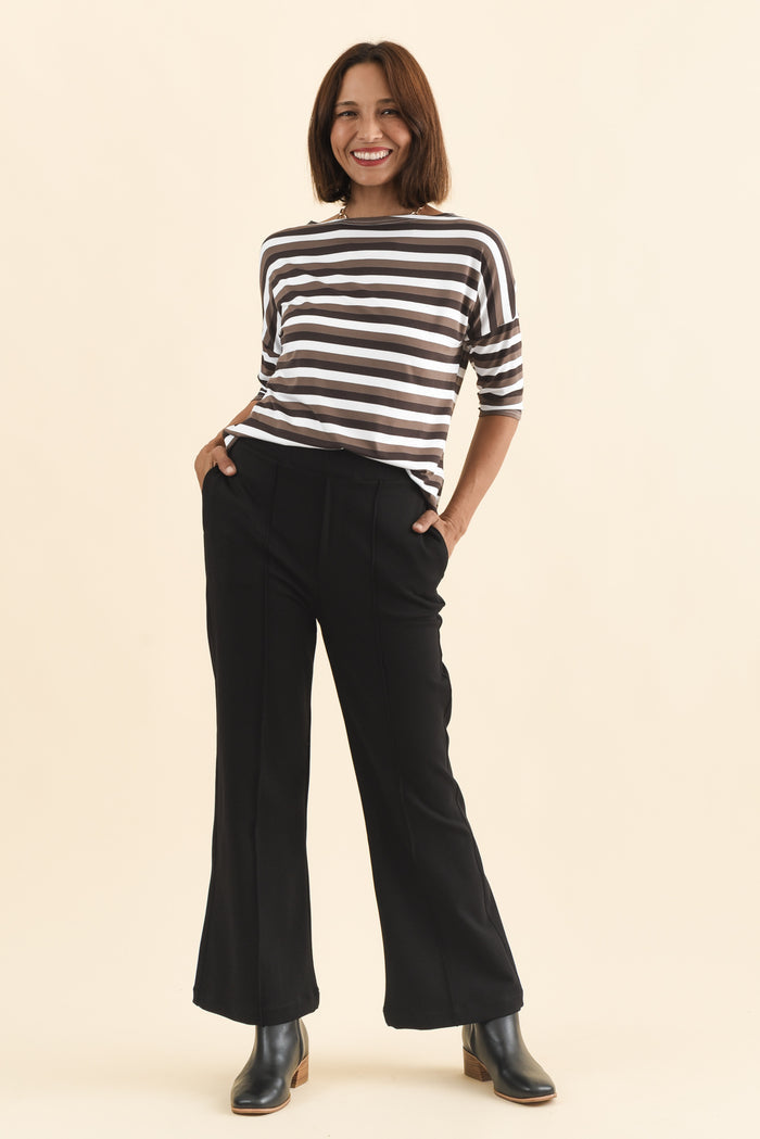 Themis Black Ponte Flare Pants,Brunette model,alt text|model:Cara