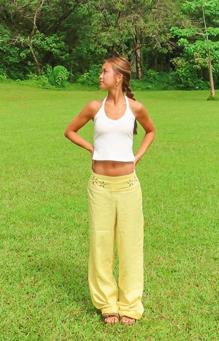 Beginning Boutique Alamara Yellow Floral Detail Wide Leg Pants yellow wide leg pants with floral cutouts on the waistband