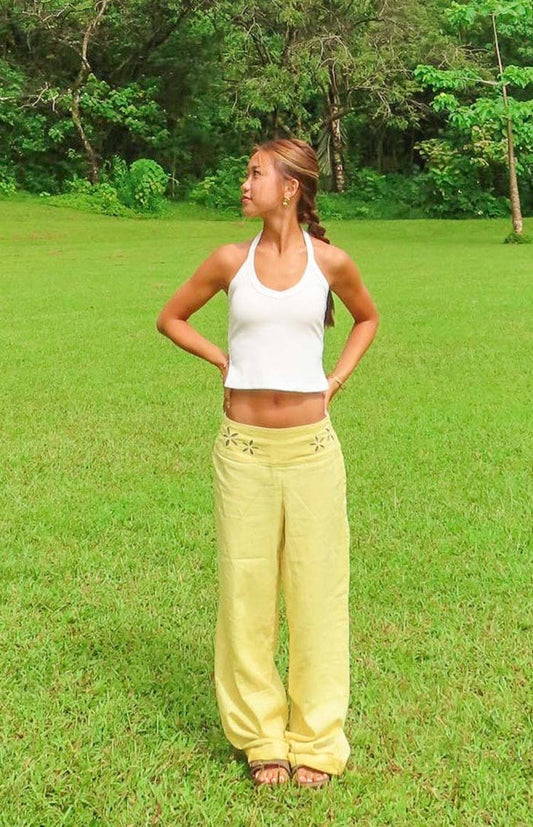 Beginning Boutique Alamara Yellow Floral Detail Wide Leg Pants yellow wide leg pants with floral cutouts on the waistband