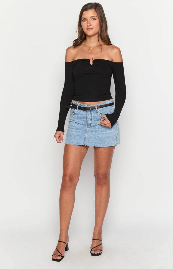 Black ribbed off-shoulder long sleeve crop top with a small keyhole cutout and metal ring