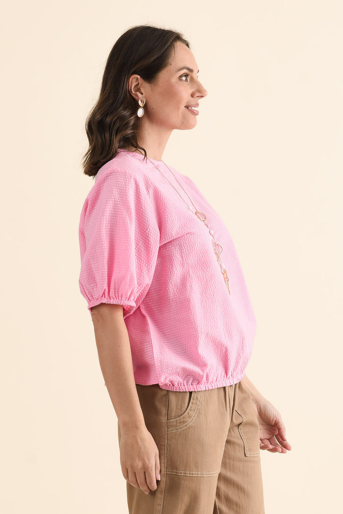 Astrid Pink Cotton Textured Top,brunette model,Side of Outfit,alt text|model:MJ