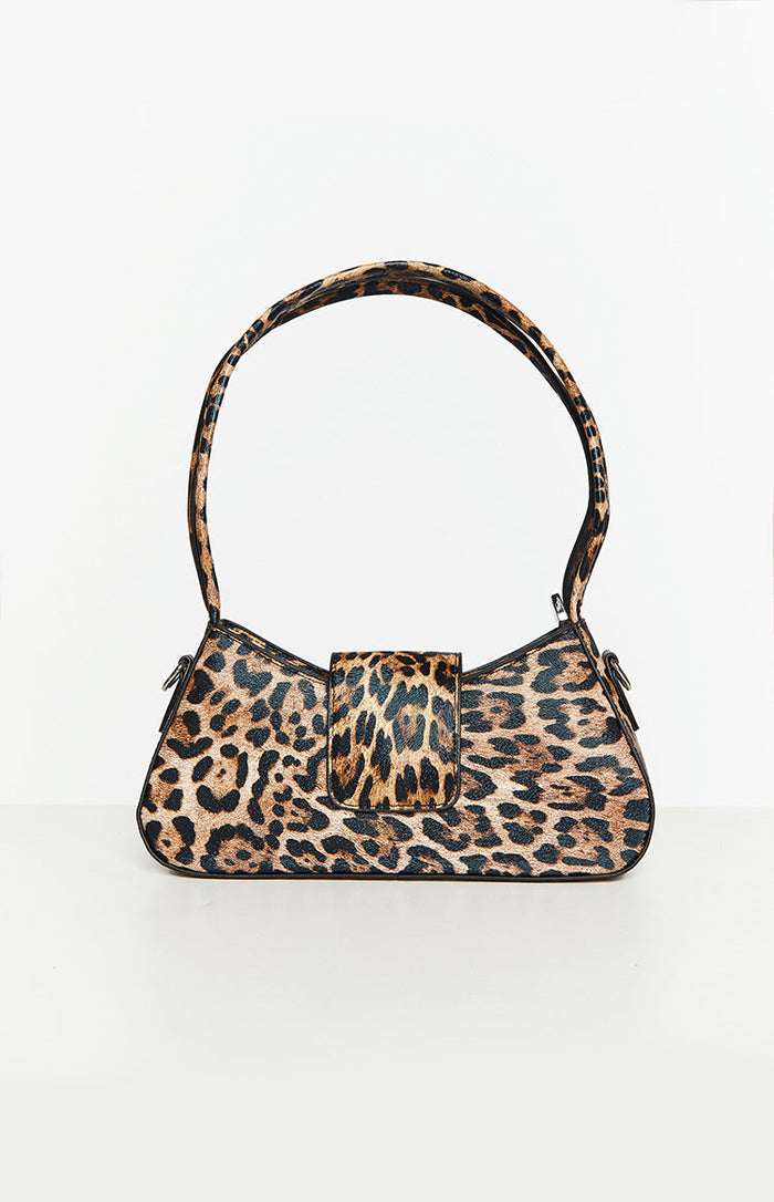 Front view of a leopard print shoulder bag with a curved handle and a front flap closure