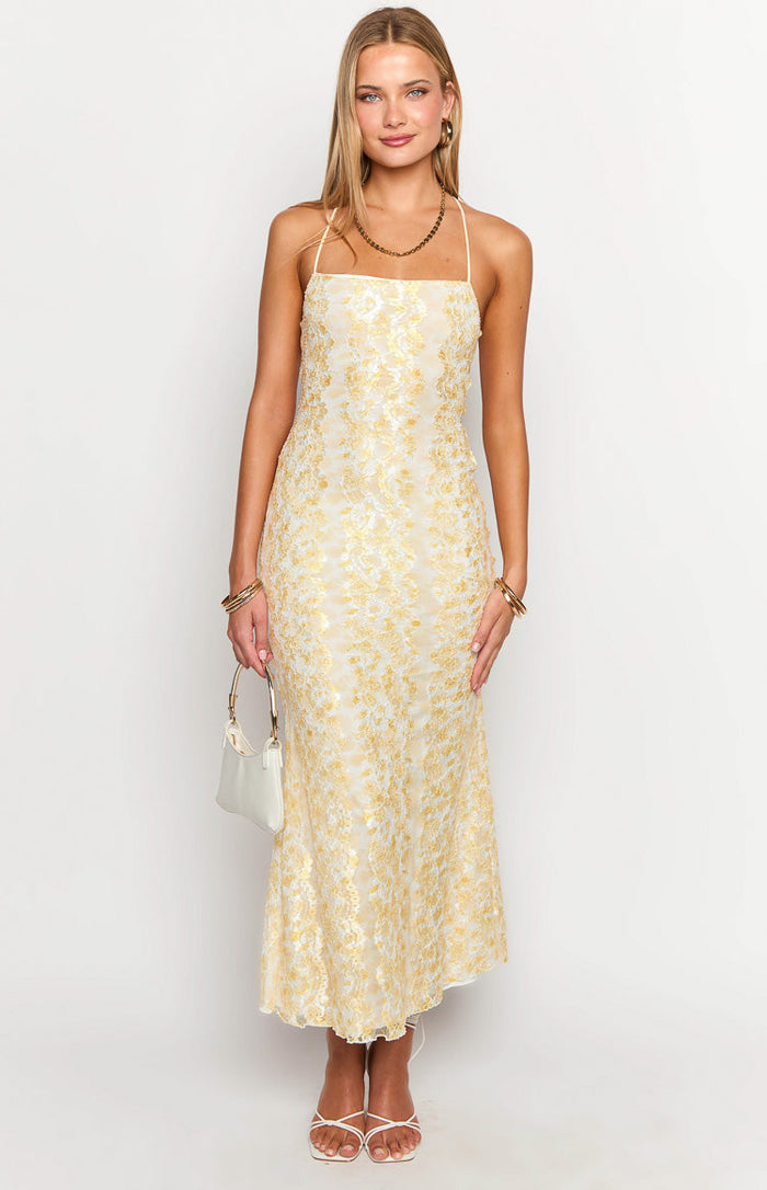 Yellow floral lace maxi dress with a square neckline and delicate spaghetti straps