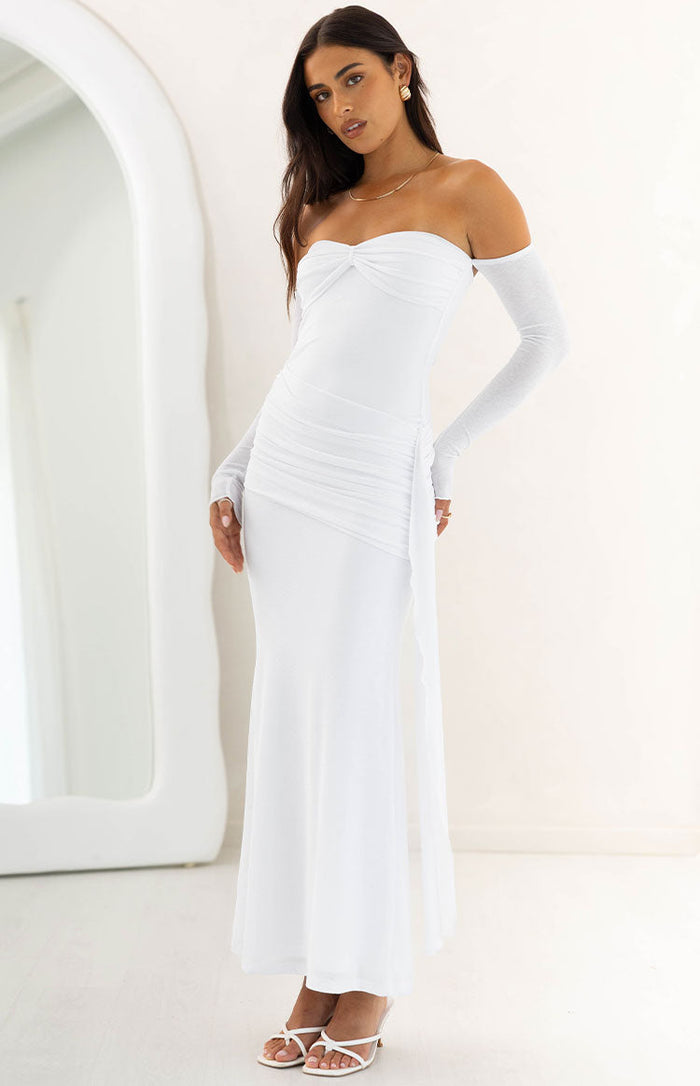 White strapless maxi dress with twisted bust, off-shoulder long mesh sleeves, and side ruching with a flowing panel