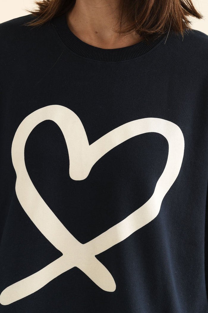 Elin Navy Heart Cotton Sweatshirt,brunette model,Close up of outfit,alt text|model:Cara