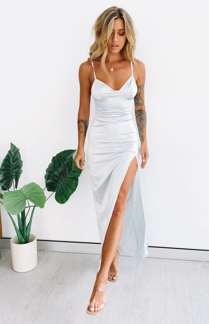 Ice blue silky formal dress with a sweetheart neckline, thin spaghetti straps, and a high side slit