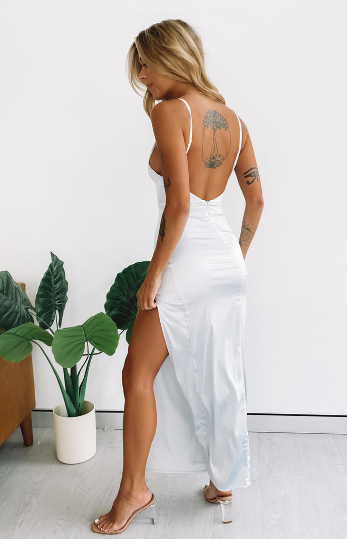 Ice blue satin maxi dress with thin straps, a low scoop back, and a high side split