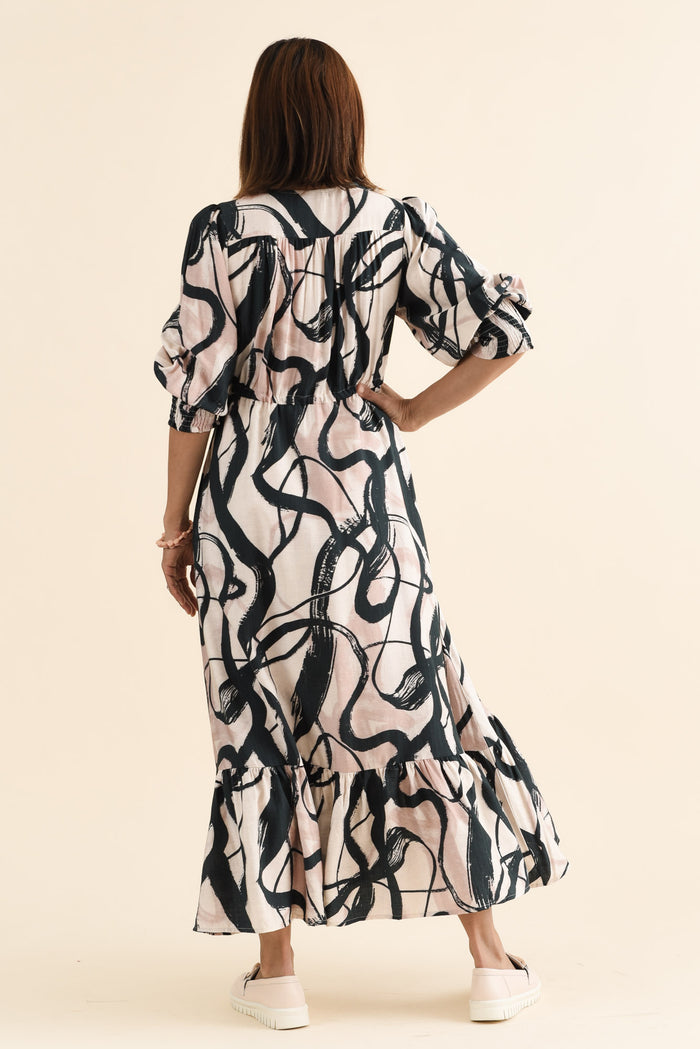 Gilda Black Brush Stroke Tie Dress,brunette model,Back of Outfit,alt text|model:Cara
