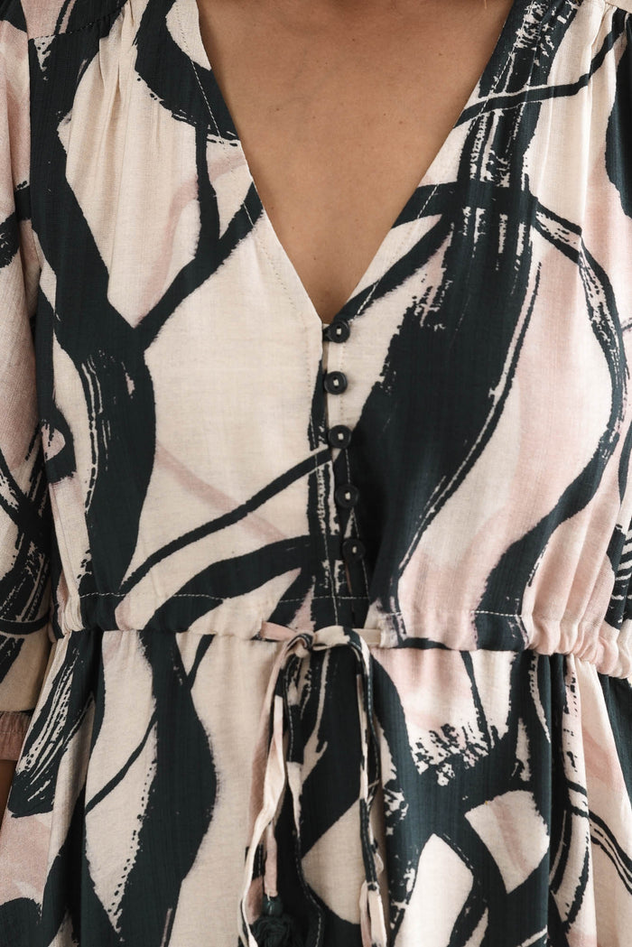 Gilda Black Brush Stroke Tie Dress,brunette model,Close up of outfit,alt text|model:Cara