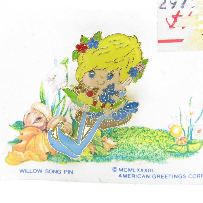 Gold enamel pin with Herself the Elf figure