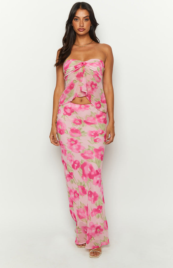 Pink floral print strapless top with a twisted knot bust and a cropped layered hem