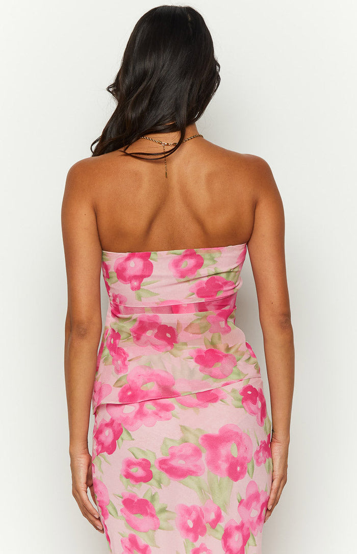 Rear view of the pink floral print strapless top, showing the fitted back and all-over pink and green rose pattern