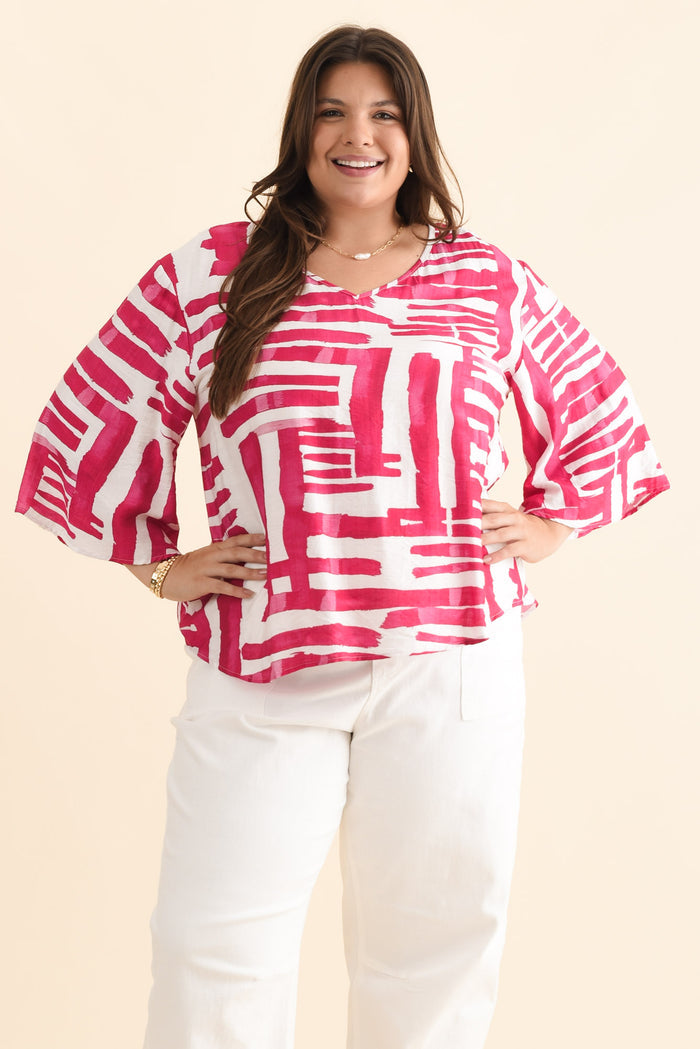 Janelle Pink Geo V Neck Top,Brunette model,plus-size,curve-tops,plus-size-sleeved-tops,alt text|model:Gabby