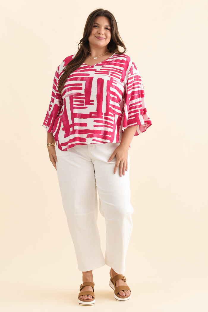 Janelle Pink Geo V Neck Top,Brunette model,alt text|model:Gabby