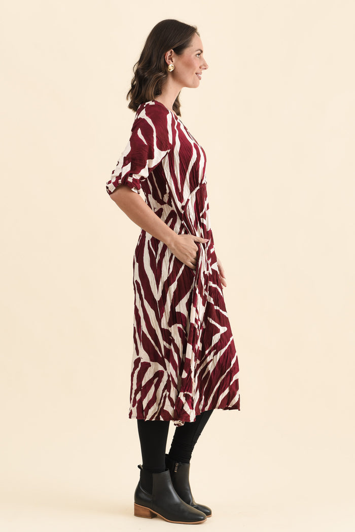 Juna Burgundy Abstract Crescent Dress,Side,Brunette model,alt text|model:MJ