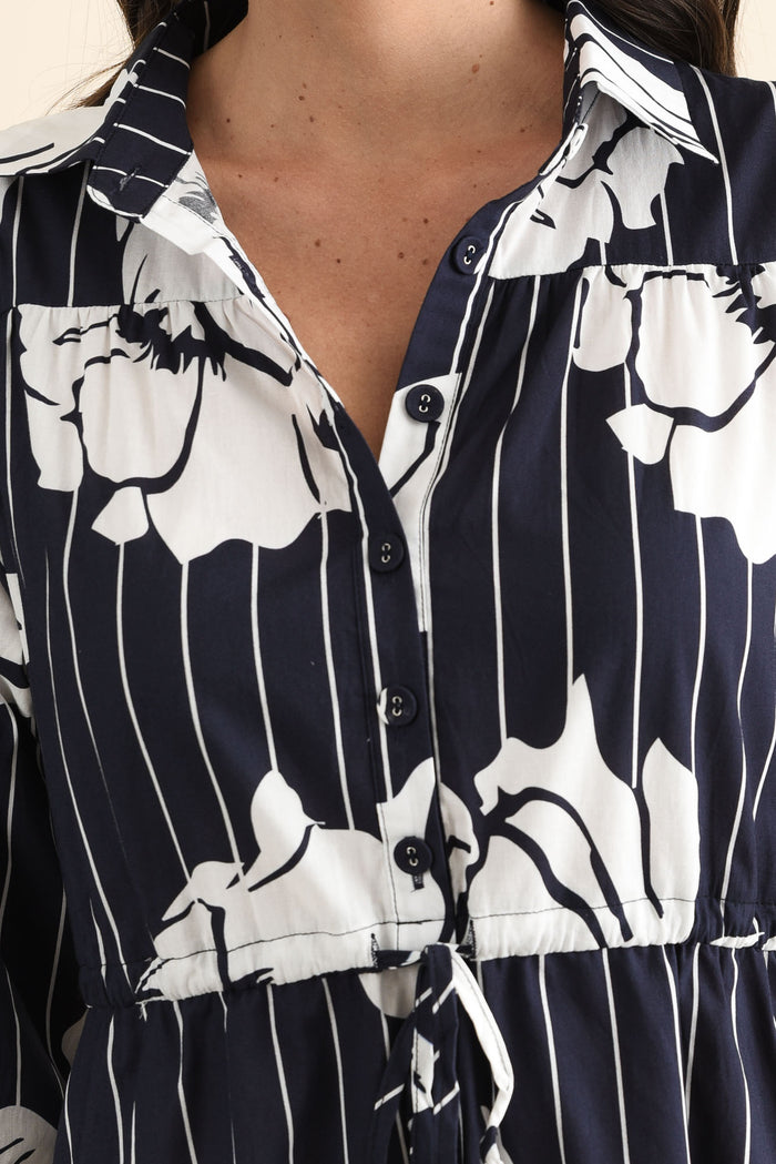 Keaton Navy Floral Stripe Tie Dress,brunette model,Close up of outfit,alt text|model:MJ