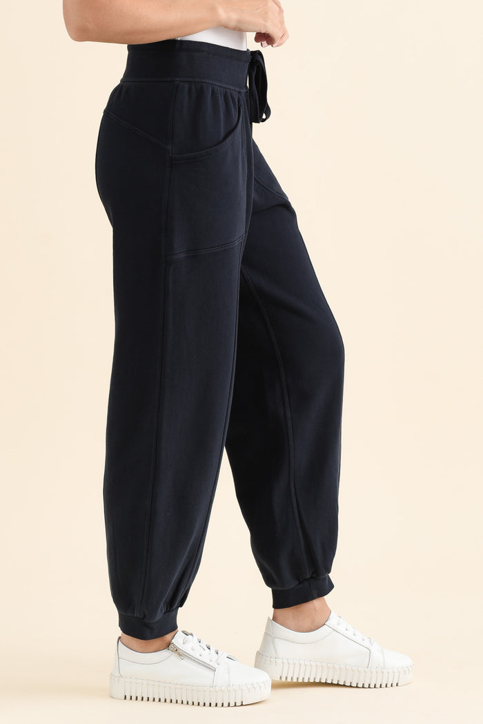Leo Navy Cotton Sweatpants,brunette model,Side of Outfit,alt text|model:MJ