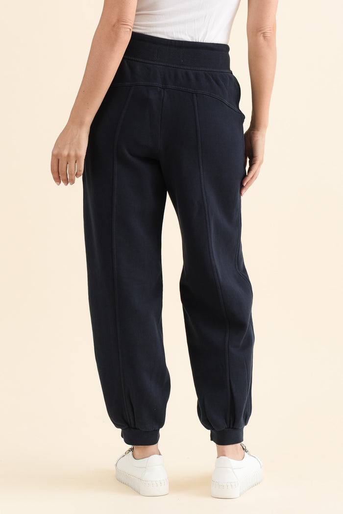 Leo Navy Cotton Sweatpants,brunette model,Back of Outfit,alt text|model:MJ