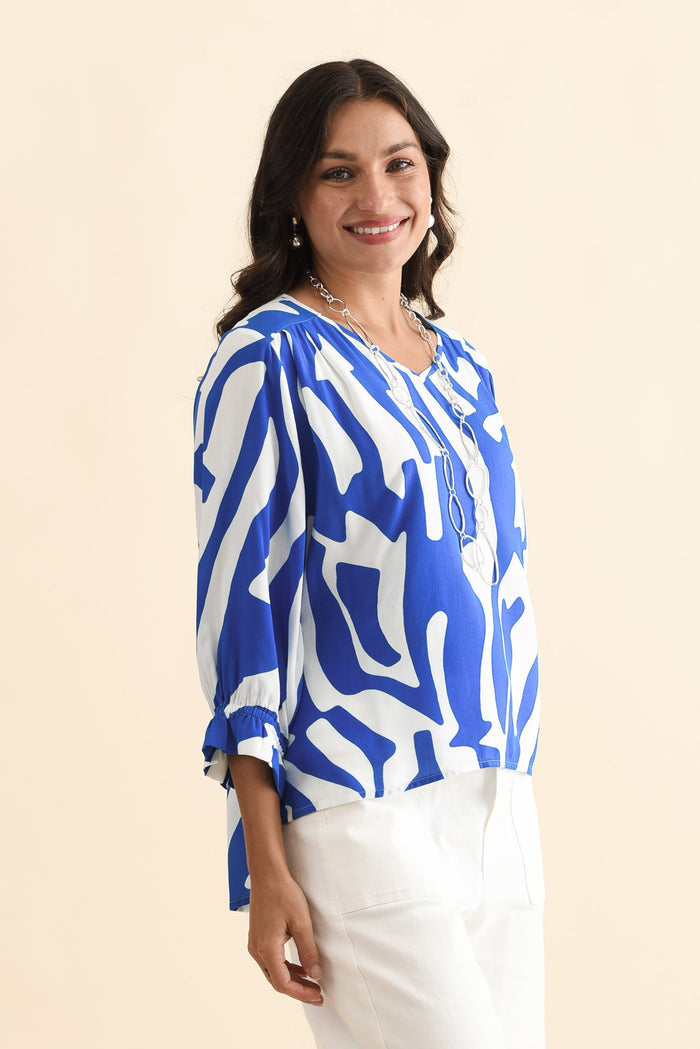 Lourdes Blue Geo Frill Sleeve Top,Brunette model,alt text|model:Brontie