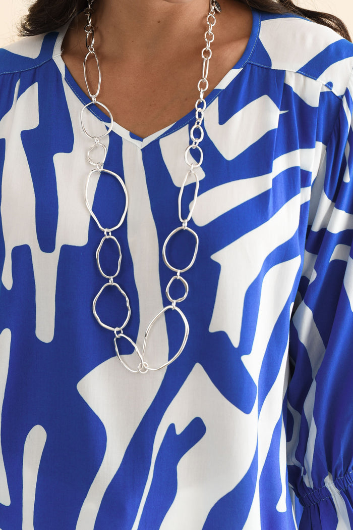Lourdes Blue Geo Frill Sleeve Top,Brunette model,alt text|model:Brontie