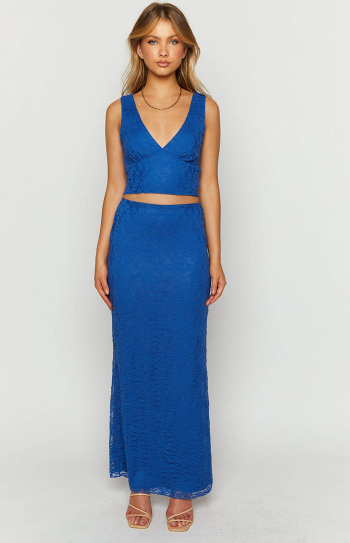Royal blue lace maxi skirt with a straight, form-fitting silhouette and delicate floral lace overlay
