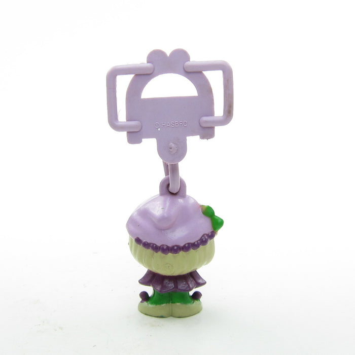 Charmkins Mollyberry charm doll with purple shoelace hanger
