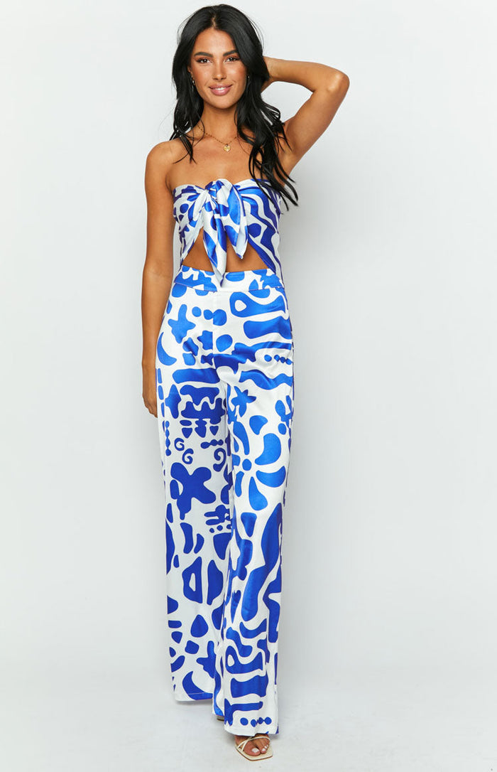 Front view of a Mykonos blue abstract print scarf top with a strapless tie-front design
