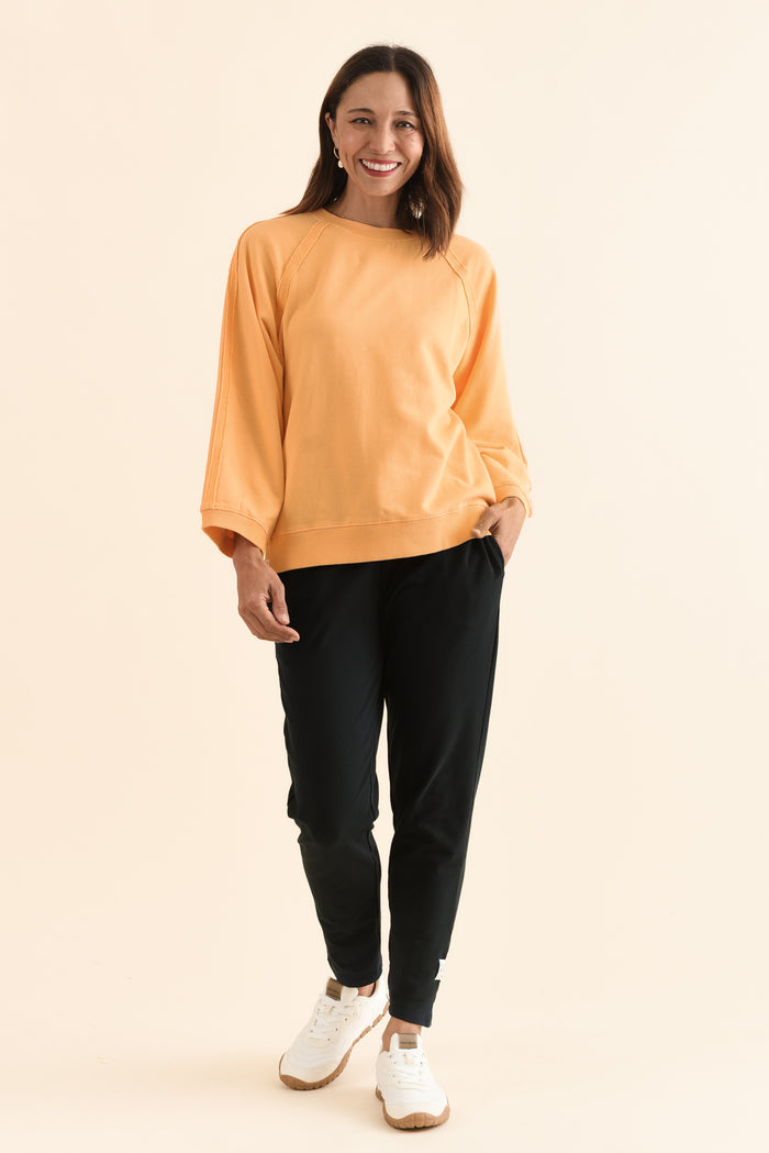 Nessa Peach Cotton Frayed Sweatshirt,Full Body,Brunette model,alt text|model:Cara