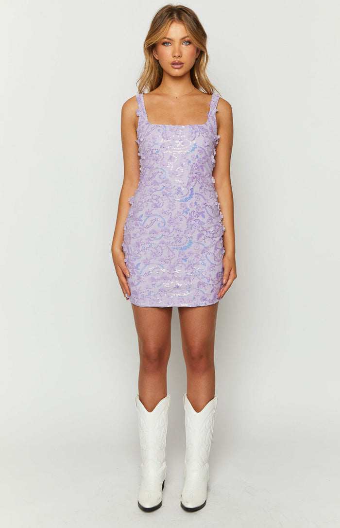 Front view of a lilac sequin mini dress with 3D floral appliques and a square neckline