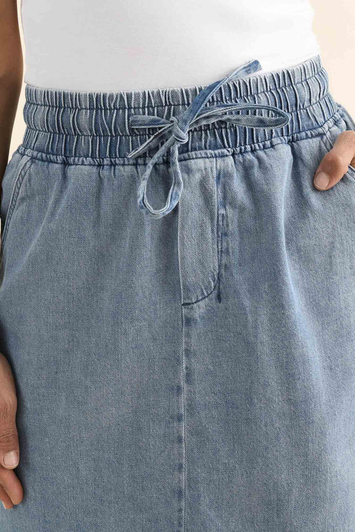 Quinn Blue Denim Drawstring Skirt,brunette model,Close up of outfit,alt text|model:Cara