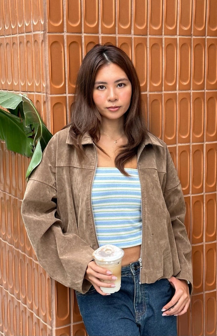 Oversized brown suedette bomber jacket with zip front, point collar, and cropped bubble hem