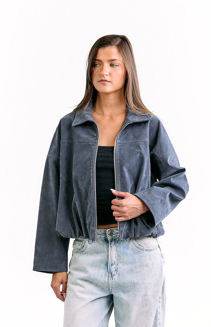 Steel grey suedette bomber jacket with a collared neckline, full zip front, and bubble hem