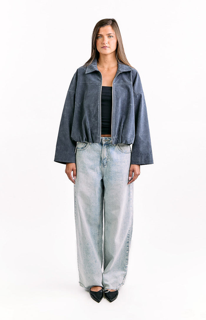 Front view of a steel grey suedette bomber jacket with a wide collar, full zip, and bubble hem