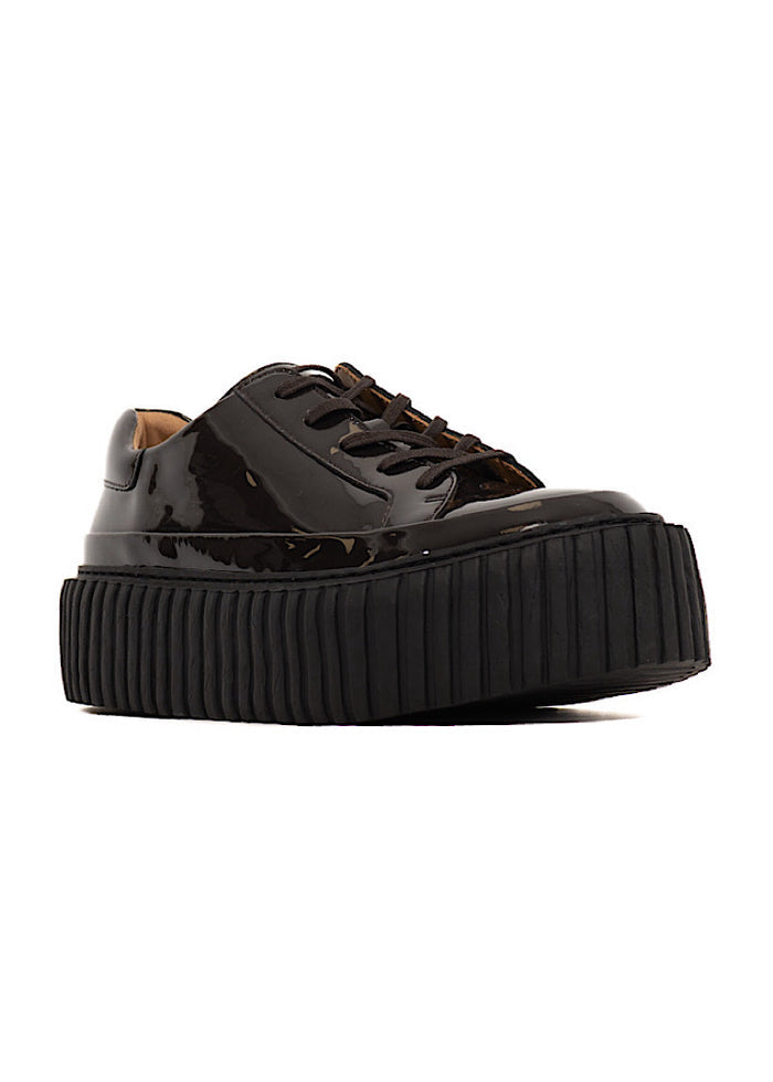 A picture of very dark Brown glossy patent leather Shoe. Showing the matching platform sole with a finishing classic lace up.