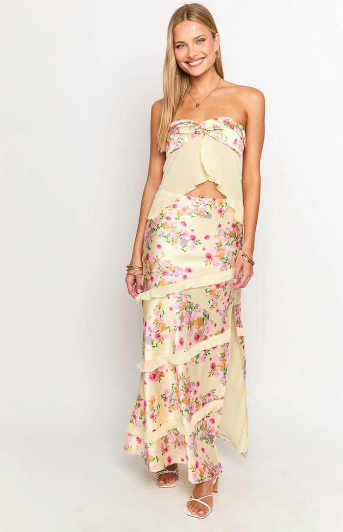 Yellow floral print satin maxi skirt with tiered ruffles and a side slit