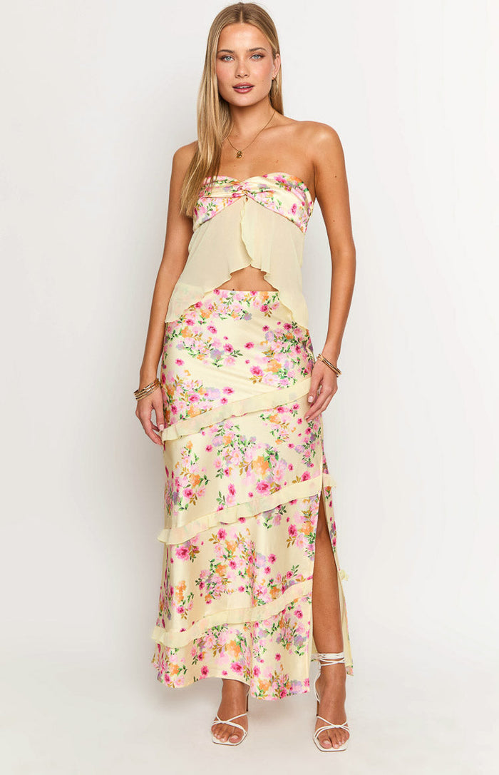 Yellow floral maxi skirt with tiered ruffles and a high side slit