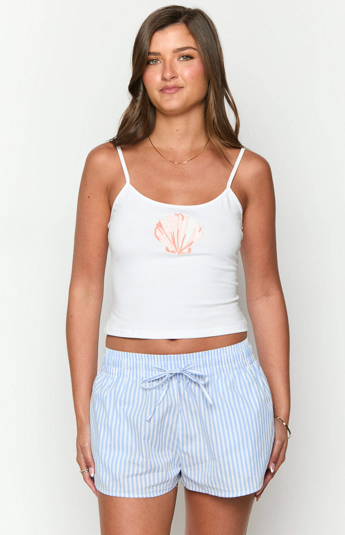 White cropped singlet with a pink shell graphic on the front, scoop neckline and thin spaghetti straps