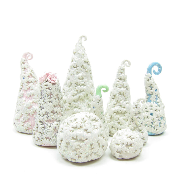Winter Wunderland village with bushes and trees