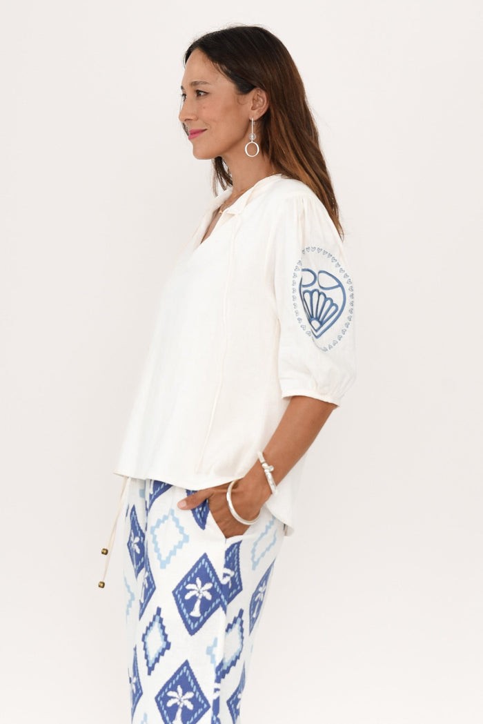 Steph Cream Seashell Embroidered Linen Top,Brunette model,alt text|model:Cara