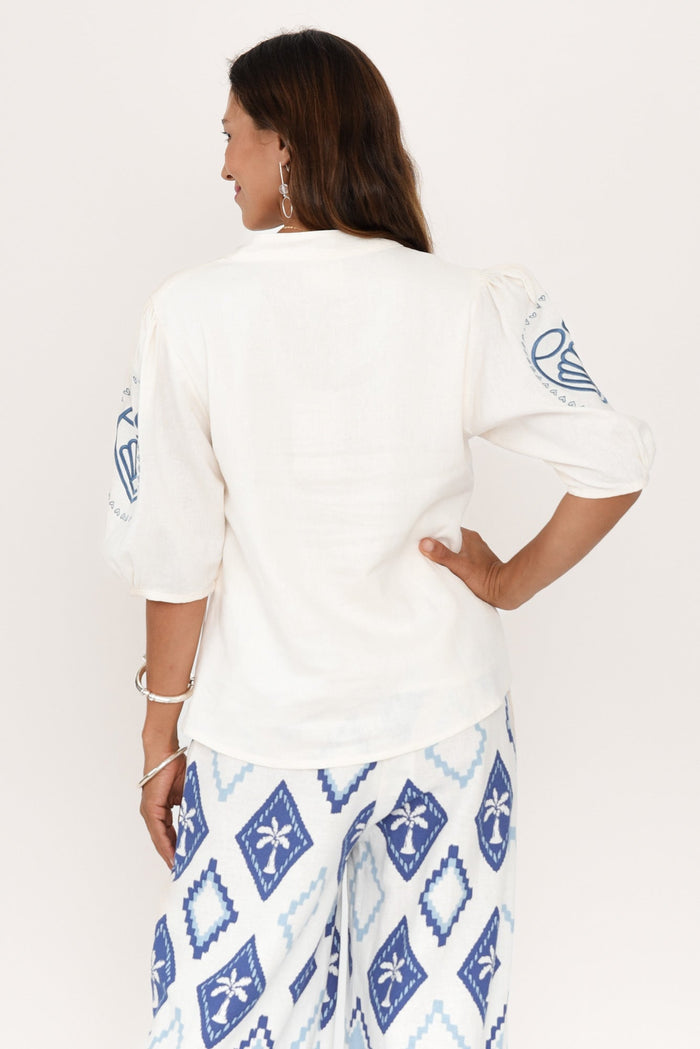 Steph Cream Seashell Embroidered Linen Top,Brunette model,alt text|model:Cara