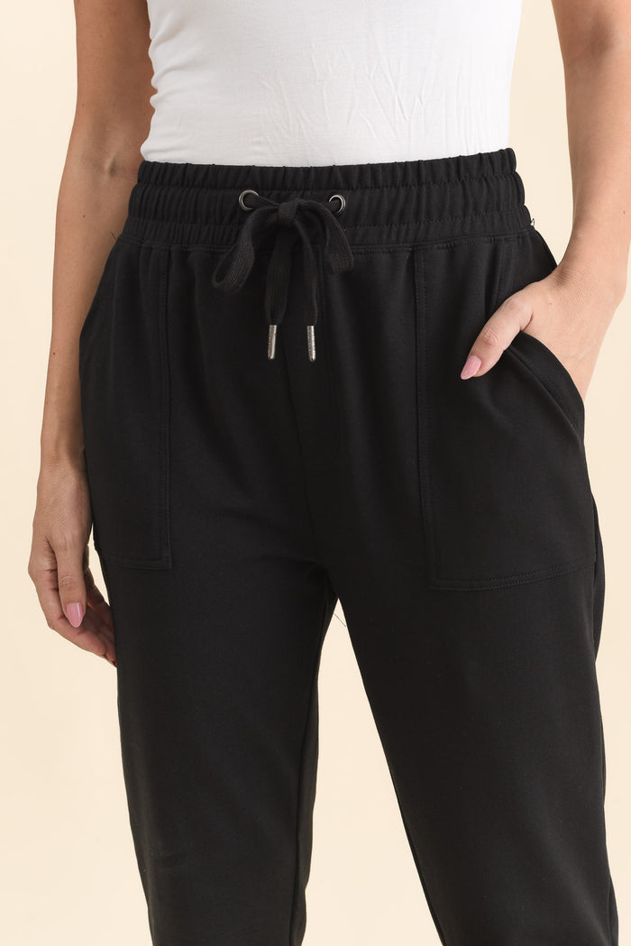 Sutton Black Cotton Relaxed Sweatpants,Detail,Brunette model,alt text|model:MJ