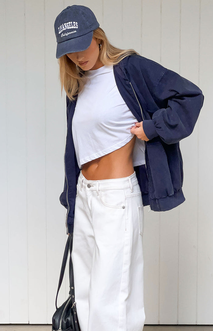 Beginning Boutique Tate Washed Navy Oversized Hooded Jacket washed navy oversized hooded jacket with full zip front and elast