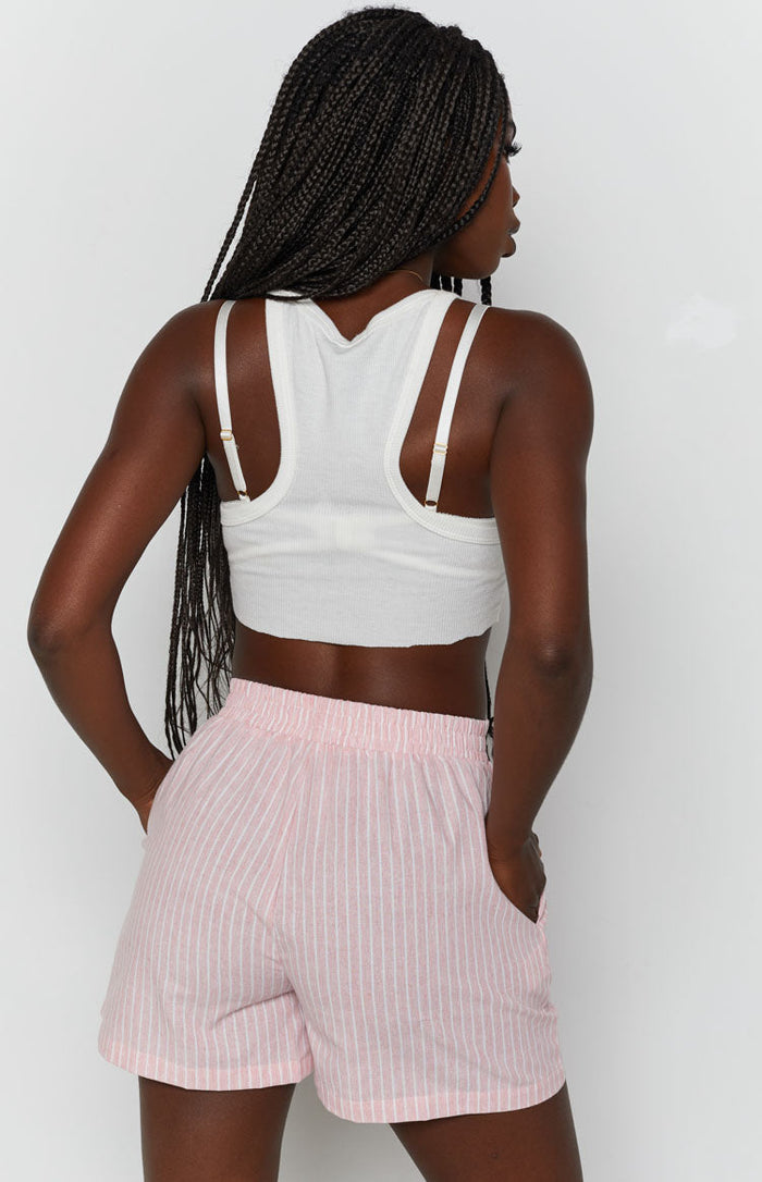Relaxed fit pink pinstripe shorts with an elasticated waistband and side pockets