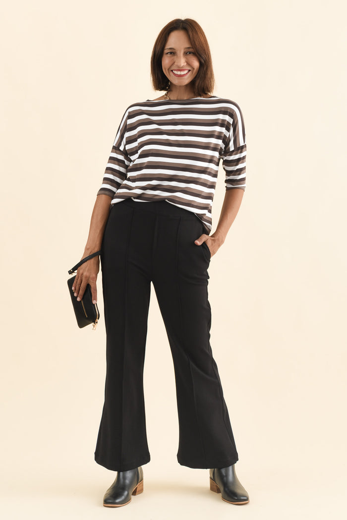 Themis Black Ponte Flare Pants,Brunette model,alt text|model:Cara