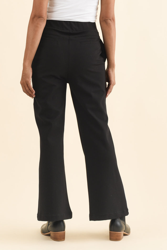 Themis Black Ponte Flare Pants,Brunette model,alt text|model:Cara