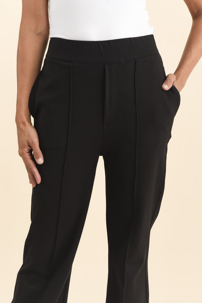 Themis Black Ponte Flare Pants,Brunette model,alt text|model:Cara