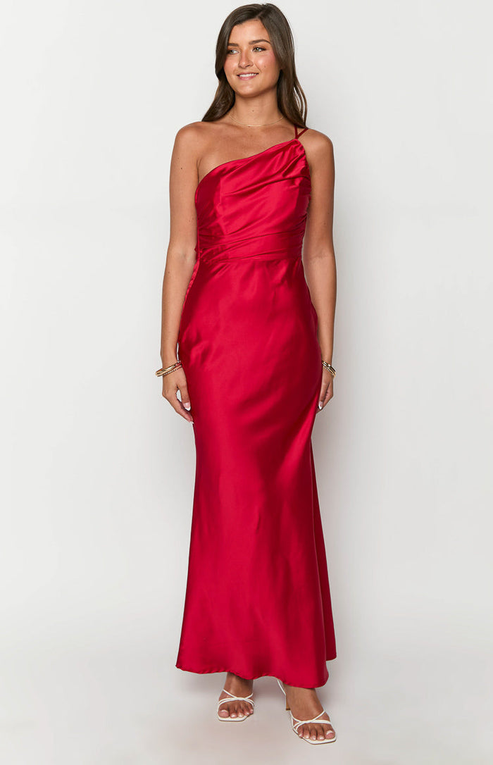 Red satin one-shoulder maxi dress with a draped neckline and ruched detailing on the fitted bodice