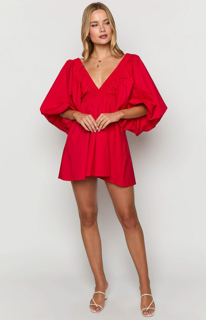 Red mini dress with a deep V-neck, voluminous short sleeves, and a gathered waist